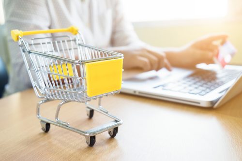 Business theme internet online shopping and delivery concept. Blur background of woman use computer laptop to shopping online